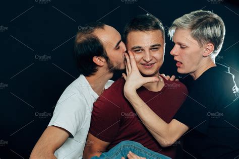 Three Guys Are Gay On Dark Backgroun High Quality People Images Three Guys Are Gay On Dark Backgroun High Quality People Images